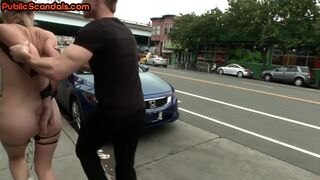 BDSM public slut with small boobs whipped outdoor on street