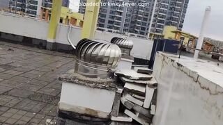 Girl Tied Up Walking On The Rooftop