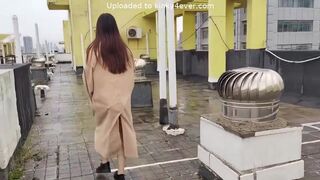 Girl Tied Up Walking On The Rooftop