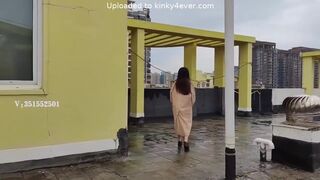 Girl Tied Up Walking On The Rooftop